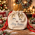Personalised velvet reindeer gift bag with glitter antlers, embroidered face and red drawstring ribbon.
