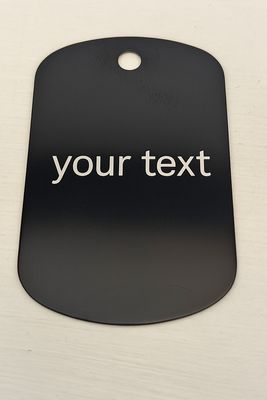 Custom pet photo keyring or tag — Anodised aluminium charm engraved with your pet’s photo, suitable for keyrings, backpacks or sentimental keepsakes.