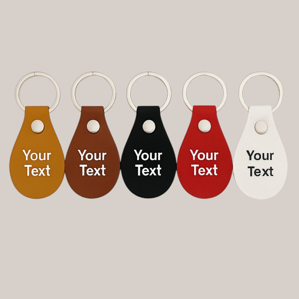 engraved leather keyring with 10 stock designs — Personalised leather keyring featuring one of ten preset engraving messages or your own custom text.