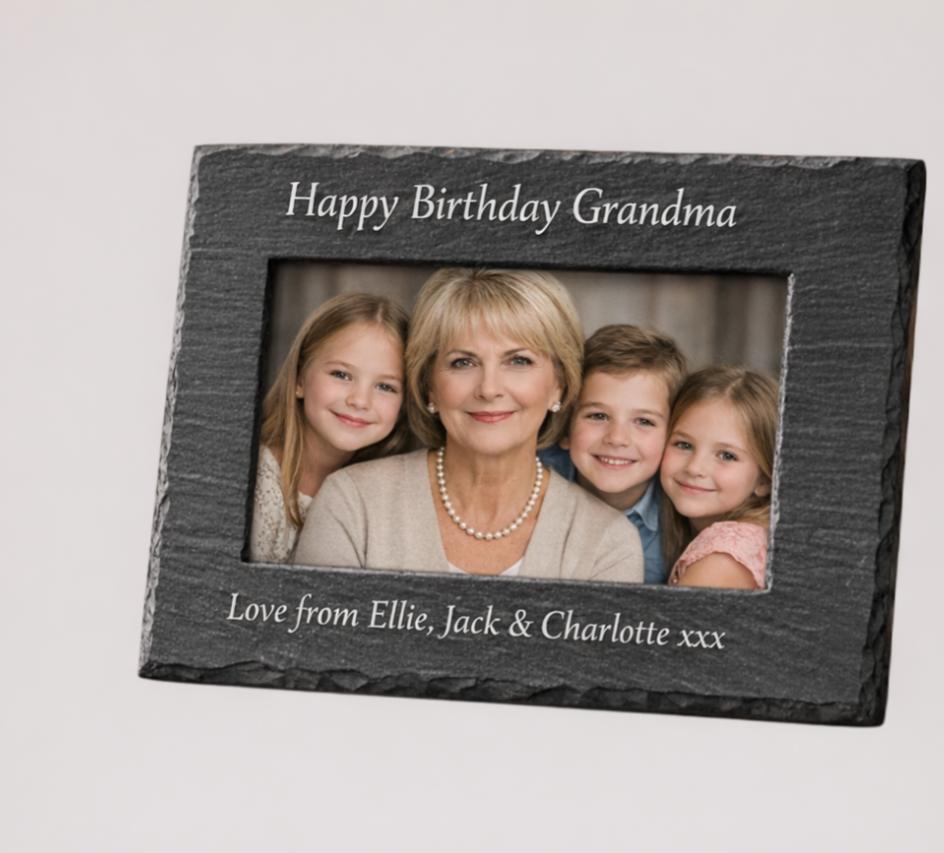 Family engraved slate photo frame — Natural slate frame engraved with a family photo in detailed line‑art style.