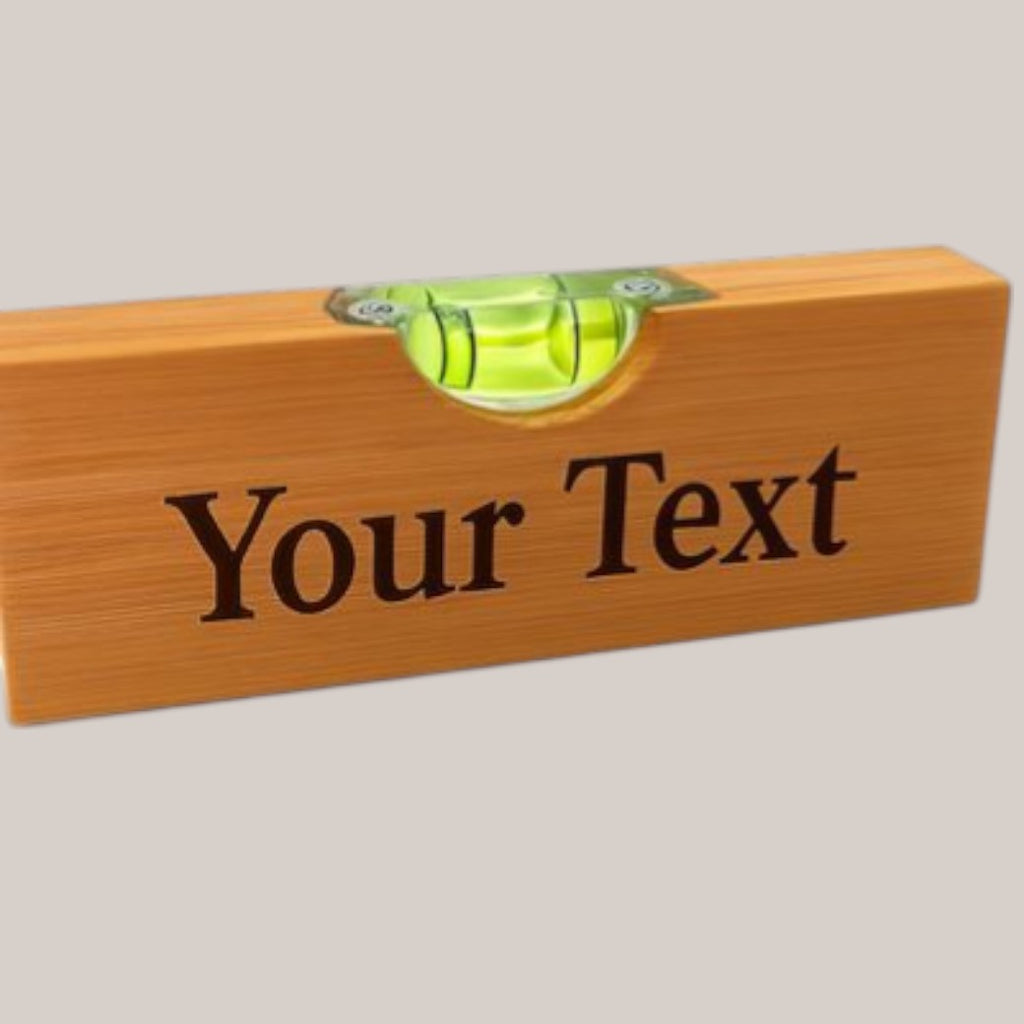 Personalised bamboo level bottle opener — Bamboo bottle opener with built‑in spirit level, engraved with your custom text.