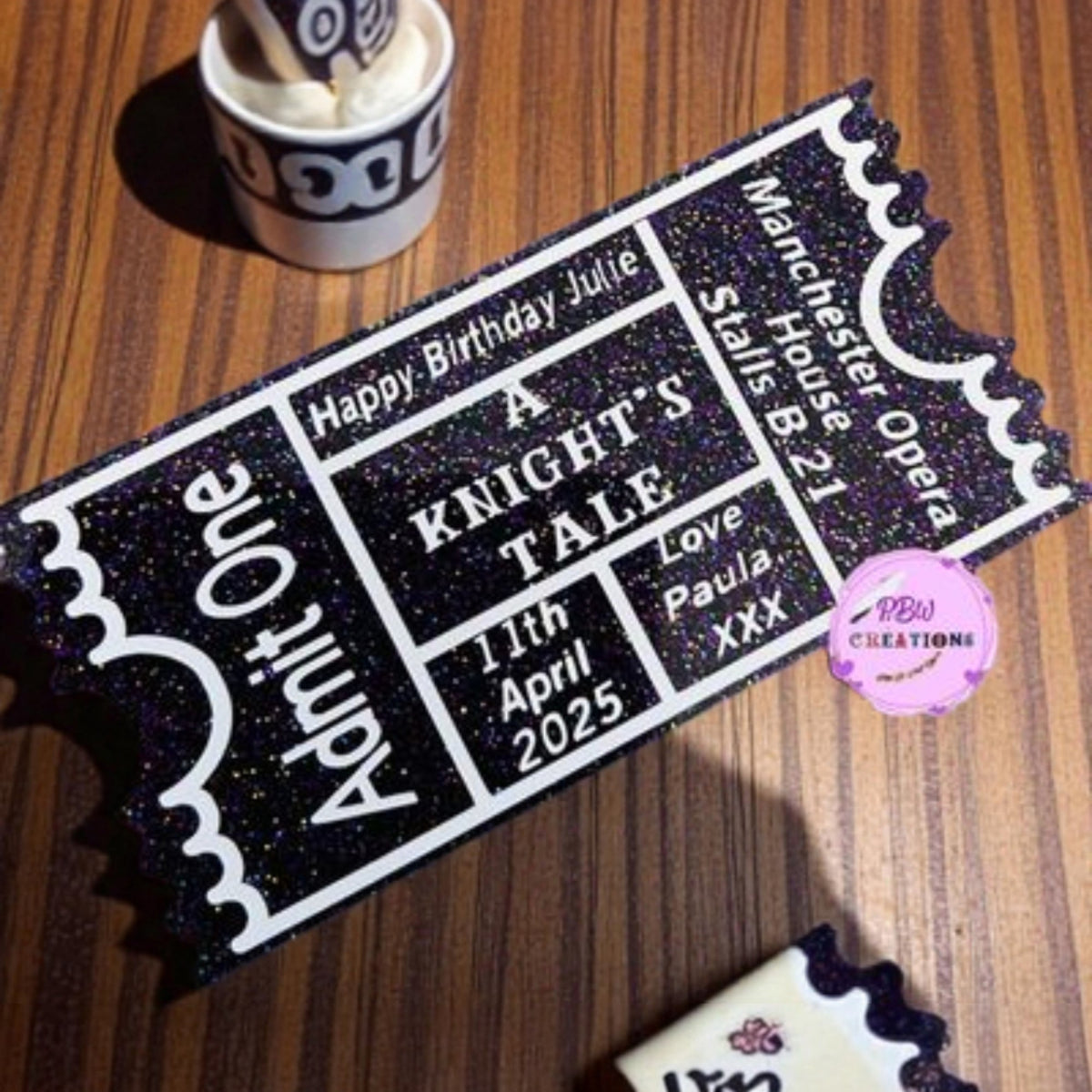 Personalised acrylic event ticket — Acrylic ticket engraved with custom venue, date and personalised event details.