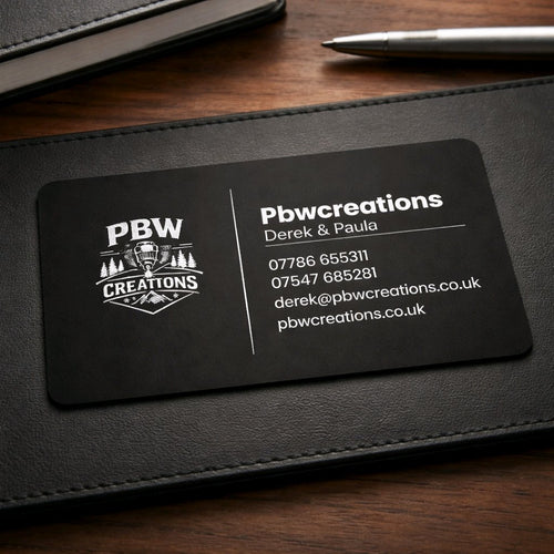 Engraved black metal cards — black metal card featuring deep laser engraving for a premium finish.